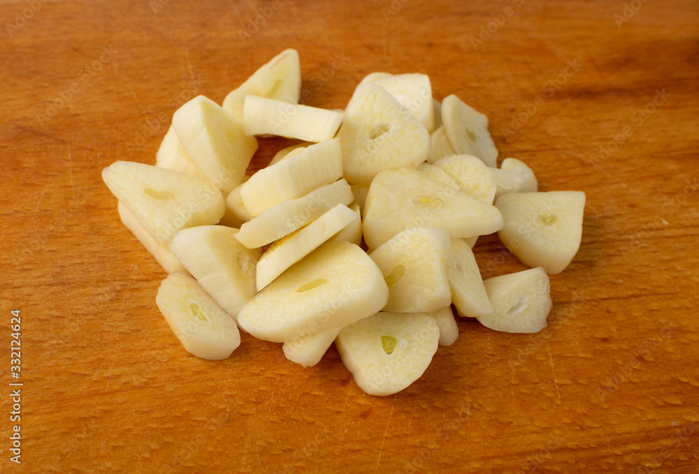 Fresh Garlic Parts Isolated on White Background Fresh Garlic Parts Isolated on White Background