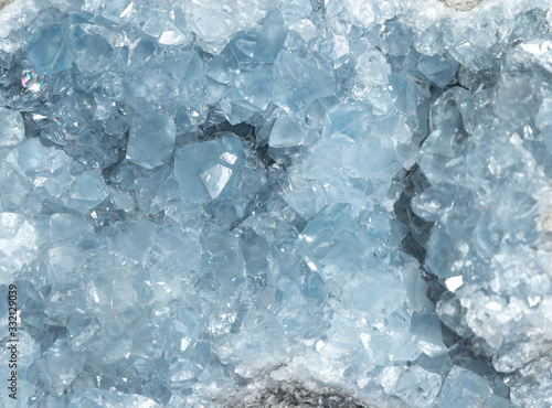 Fotografie Blue celestite geode crystal background