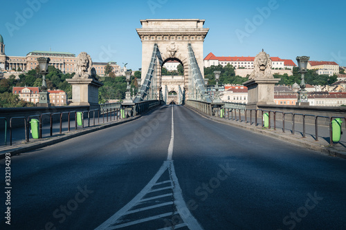 The stately Budapest Chain Bridge in a wonderful morning light, Hungary 2019. The bridge opened in 1849, the stone lions were installed in 1852.
