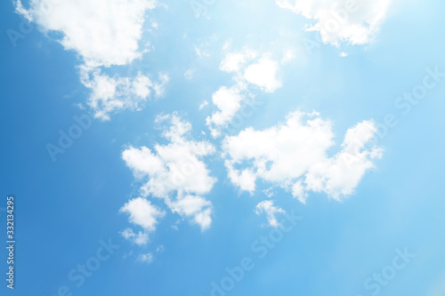 Cloud sky sunrise during morning background. Blue pastel heaven,soft focus lens flare sunlight. Abstract blurred white cyan gradient of peaceful nature. Open view windows beautiful summer spring