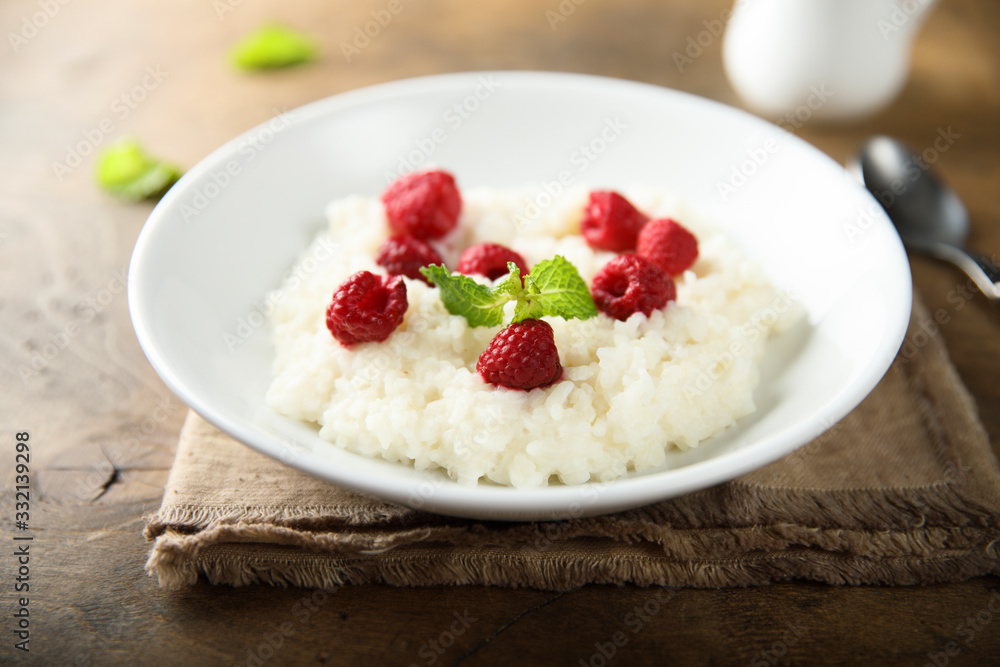 Homemade rice pudding with fresh raspberry Homemade rice pudding with fresh raspberry