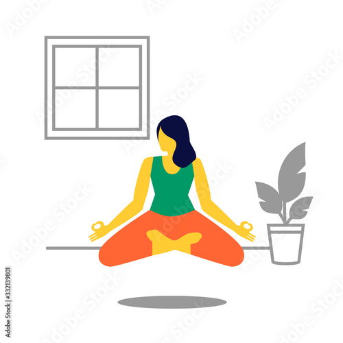 Chica joven practicando yoga y meditando en la posición del loto. photo