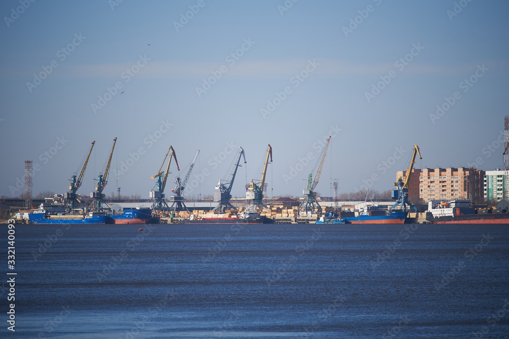 Floating cranes on the Volga River