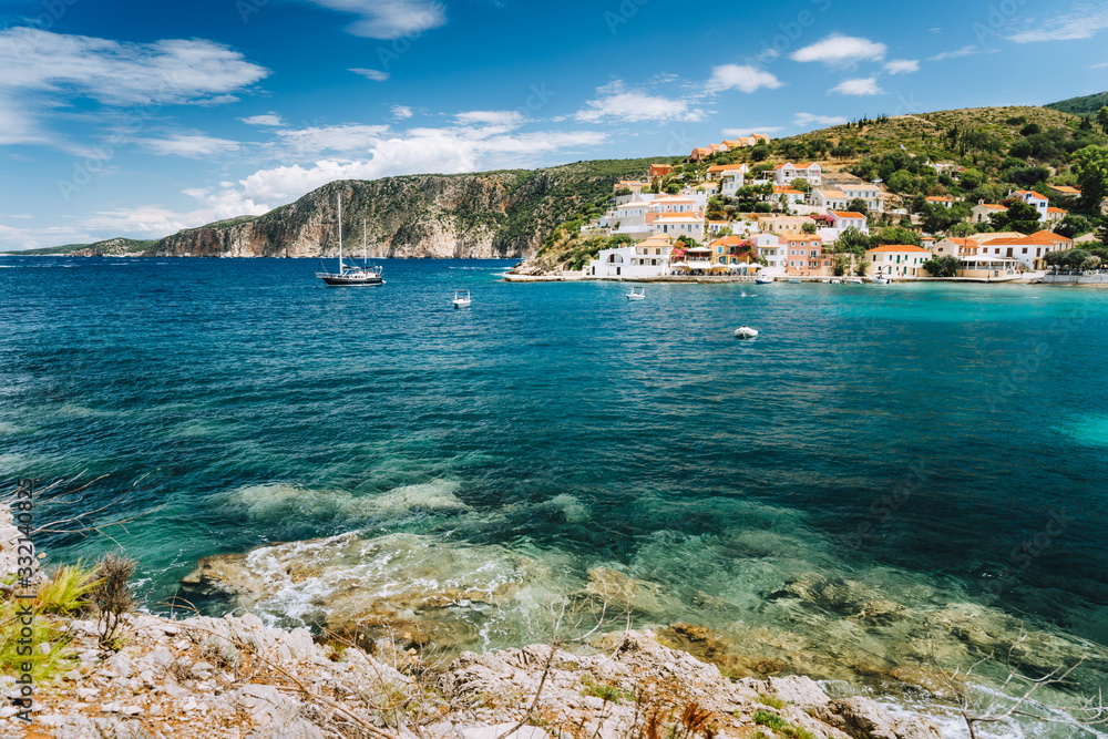 Beautiful Assos small town located on Kefalonia island. Summer vacation season in Greece Beautiful Assos small town located on Kefalonia island. Summer vacation season in Greece