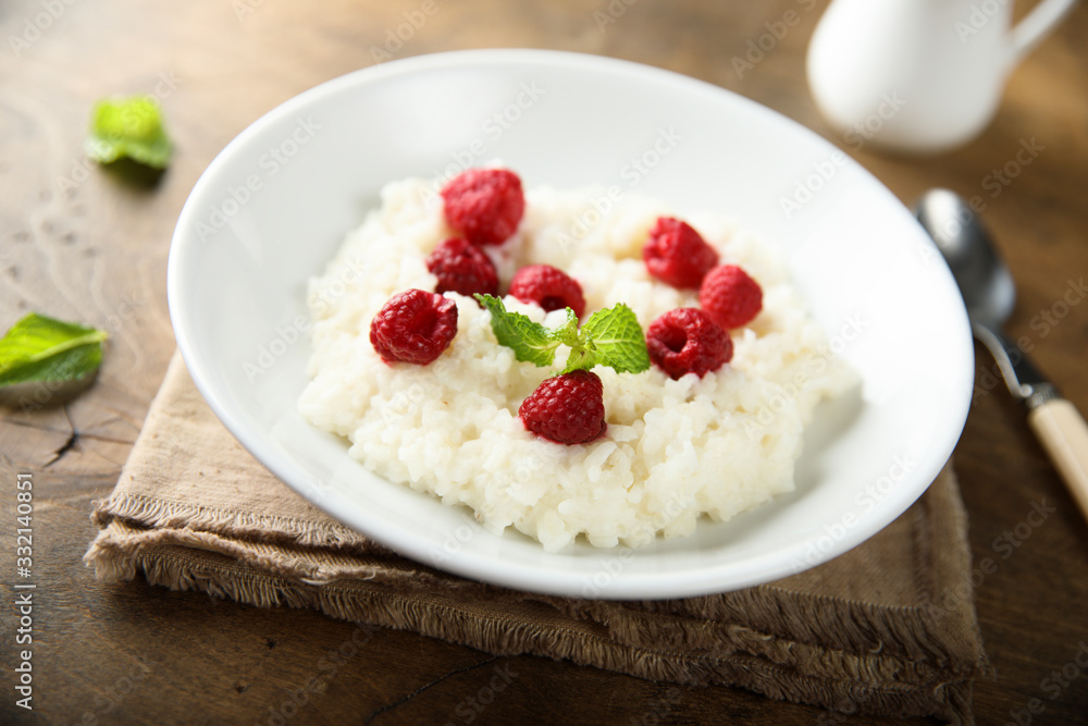 Homemade rice pudding with fresh raspberry