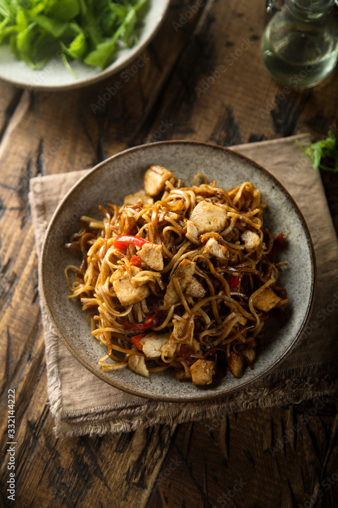 Homemade rice noodles with chicken and vegetables Stock Photo | Adobe Stock