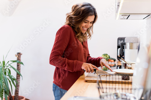 Young woman making cookies