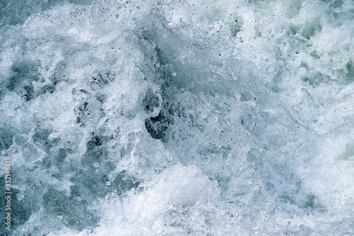 Blue and turquoise water with irregular wave structure