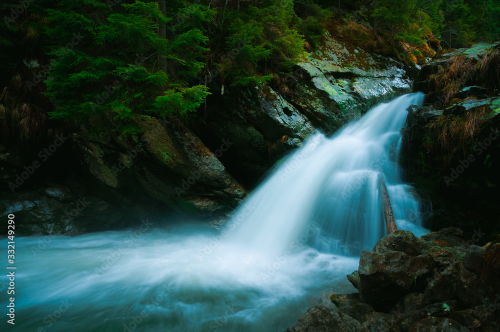 Waterfall mountain view close up. Mountain river waterfall landscape. Waterfall river scene Waterfall mountain view close up. Mountain river waterfall landscape. Waterfall river scene