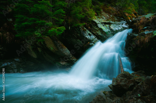 Waterfall mountain view close up. Mountain river waterfall landscape. Waterfall river scene