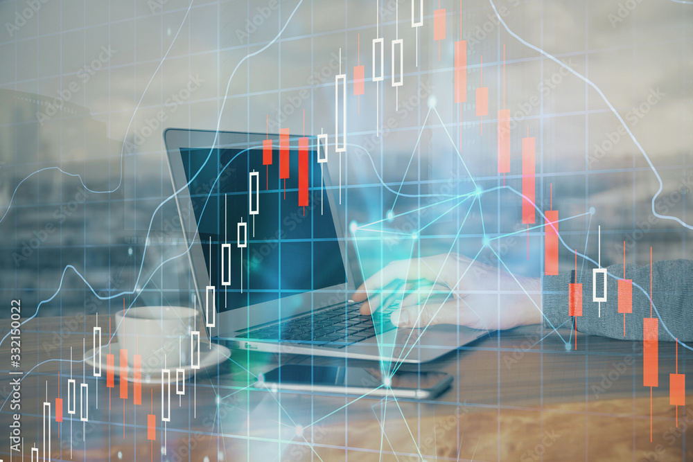 Double exposure of stock graph with businessman typing on computer in office on background. Concept of hard work. Double exposure of stock graph with businessman typing on computer in office on background. Concept of hard work.