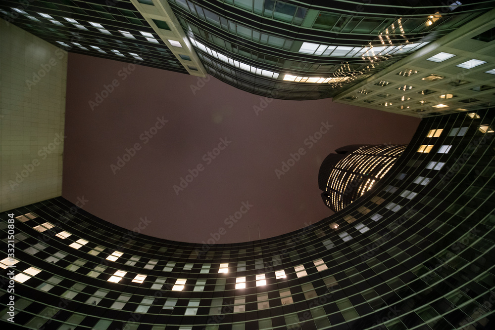 Obraz premium business office at night - corporate building