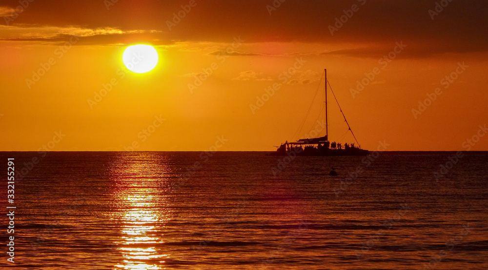Stunning sunset in Negril, Jamaica. Bright colors