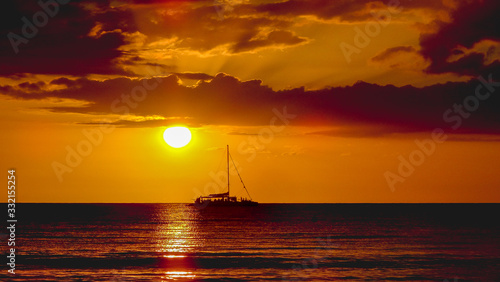 Stunning sunset in Negril, Jamaica. Bright colors photo