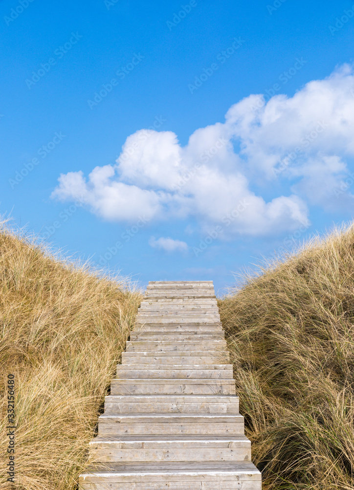 Wooden stairs across dune at German North Sea island of Amrum