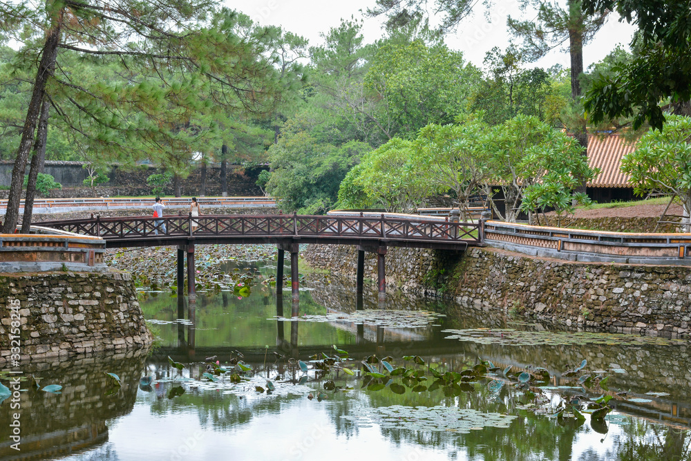 Bridge crossing Luu Khiem Lake in the Tomb of Emperor Tu Duc. Hue, Vietnam Bridge crossing Luu Khiem Lake in the Tomb of Emperor Tu Duc. Hue, Vietnam