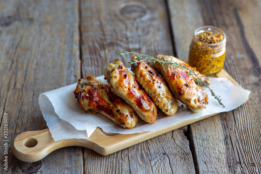 Fried chicken with beer on a wooden table