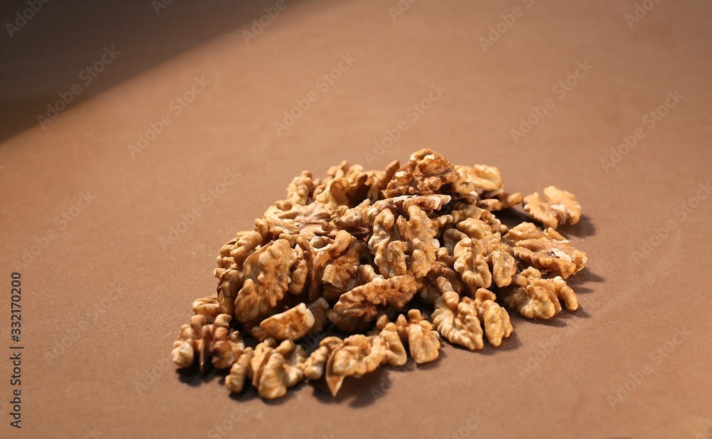 Walnut halves on table ready for food. Walnut halves on table ready for food.