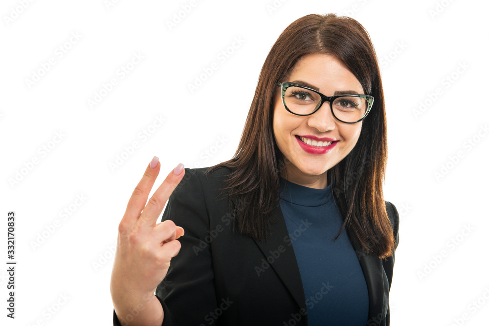 Portrait of young business girl wearing glasses showing two Portrait of young business girl wearing glasses showing two