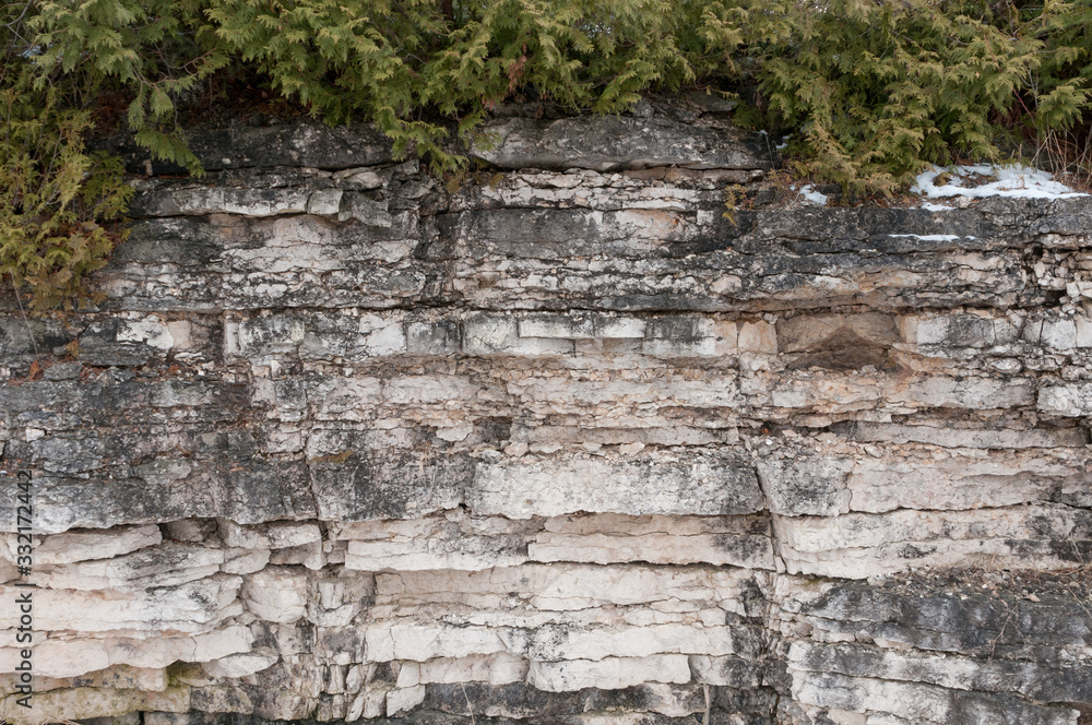 450 million year old Niagara Escarpment dolomite stone ridge near Green Bay shoreline.. 450 million year old Niagara Escarpment dolomite stone ridge near Green Bay shoreline..