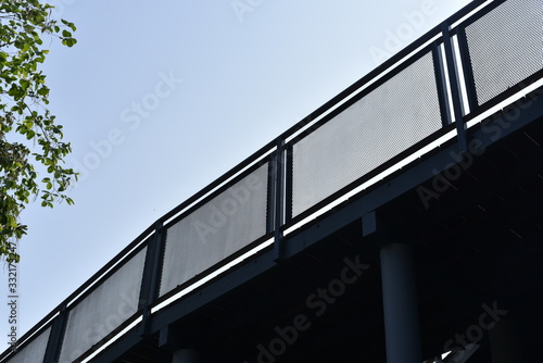 industrial steel railing with blue sky background