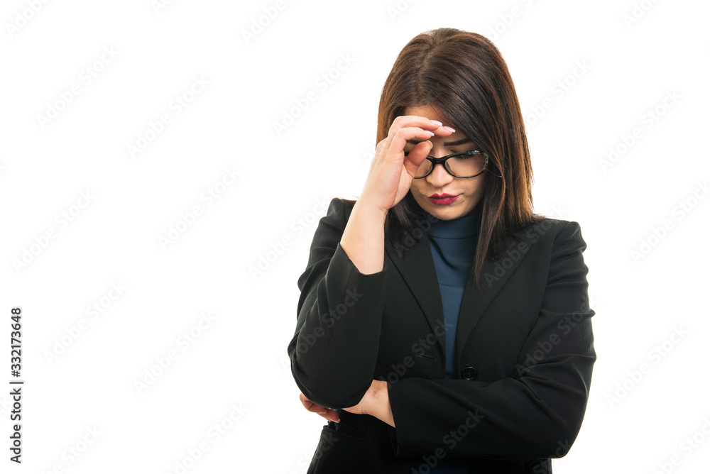 Portrait of young business girl wearing glasses making thinking gesture Portrait of young business girl wearing glasses making thinking gesture