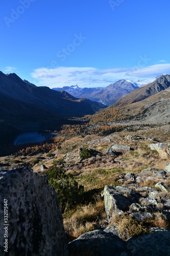 Bergsee in autumn in the Swiss mountains in autumn in the morning mood