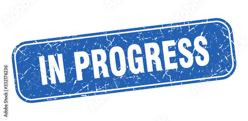 in progress stamp. in progress square grungy blue sign.