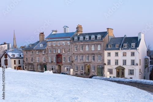 Beautiful dawn winter view of row of mid-19th Century houses on St. Denis Avenue seen from the Cape Diamond, Quebec City, Quebec, Canada