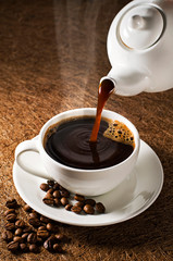 Küchenrückwand glas motiv Kaffee und Kaffeebohnen Kaffee einschenken  © Dušan Zidar