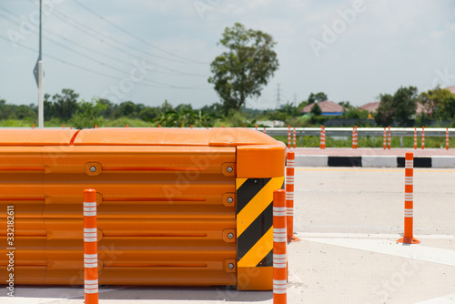 Crash Cushion or  Impact Attenuator installed in highway intersections and accident-prone areas. (side view) photo