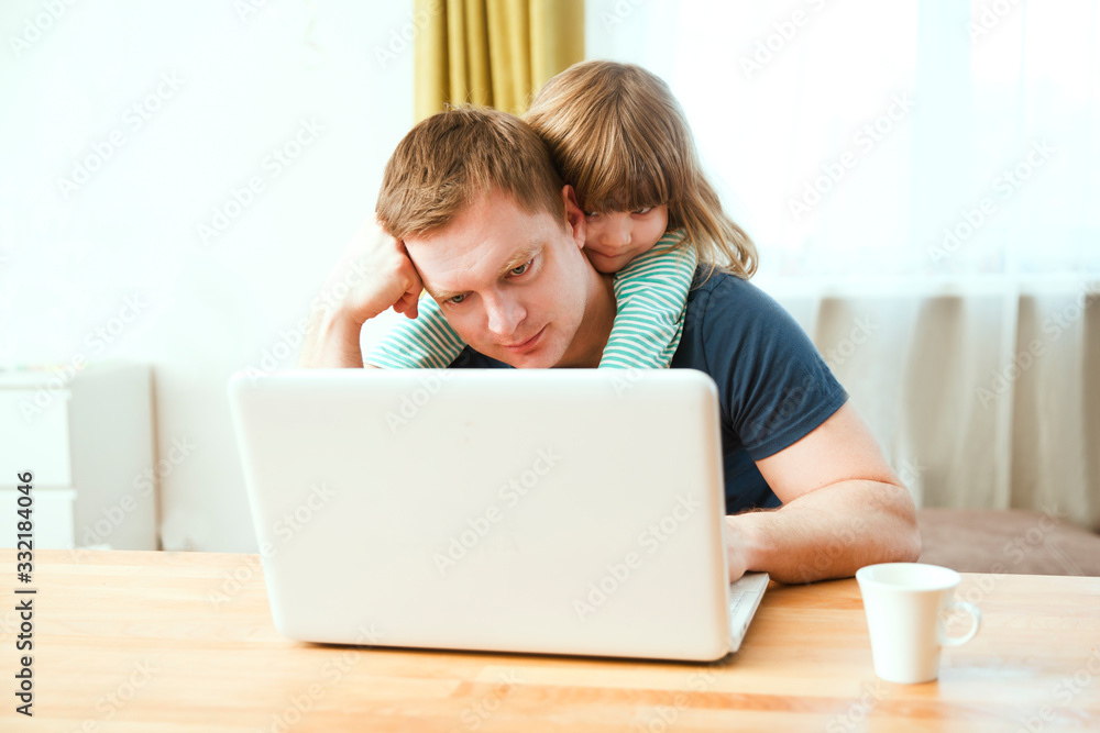 Home office. Working from home vs. Dad wearing medical face Work with chid kid on the Internet on a laptop at home. quarantine. Corona Virus. stay home concept Home office. Working from home vs. Dad wearing medical face Work with chid kid on the Internet on a laptop at home. quarantine. Corona Virus. stay home concept