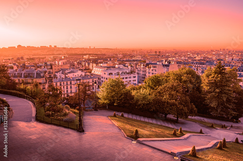 Overlooking the rooftops at sunrise from Montmartre Hill, Paris, France