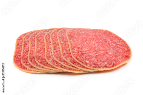 Salami slices isolated on white background.