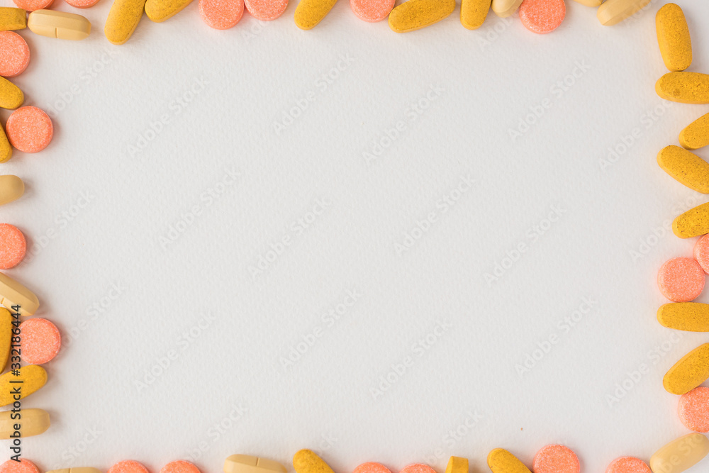 Healthy frame with Pharmaceutical medicine pills, tablets and capsules on bright light white background. Medicine creative concepts. medical pattern, top view, flat lay. Copy spac