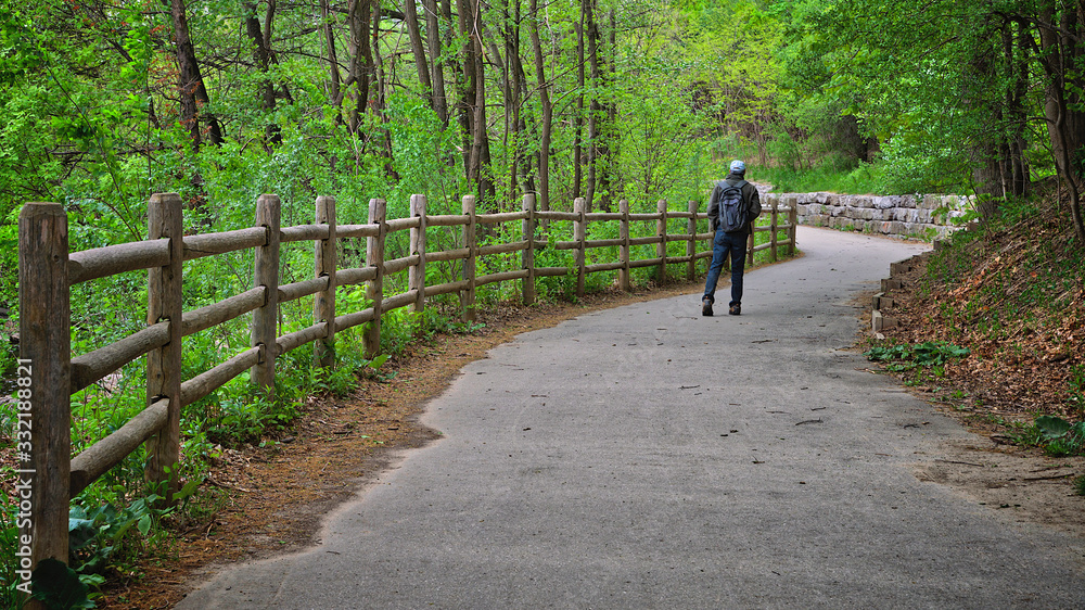 Healthy lifestyle - walking in the public park Healthy lifestyle - walking in the public park