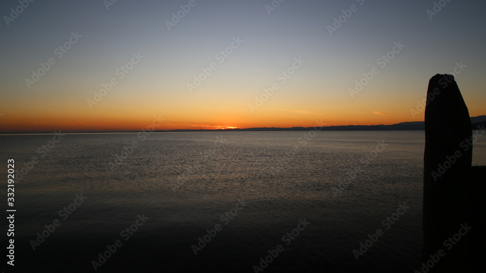 Fototapeta premium Sunset at the Garda lake - Italy