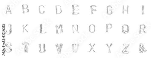 Font print on metal. Extruded stamp on a metal surface. The English alphabet is isolated on a white background. Fairytale font.