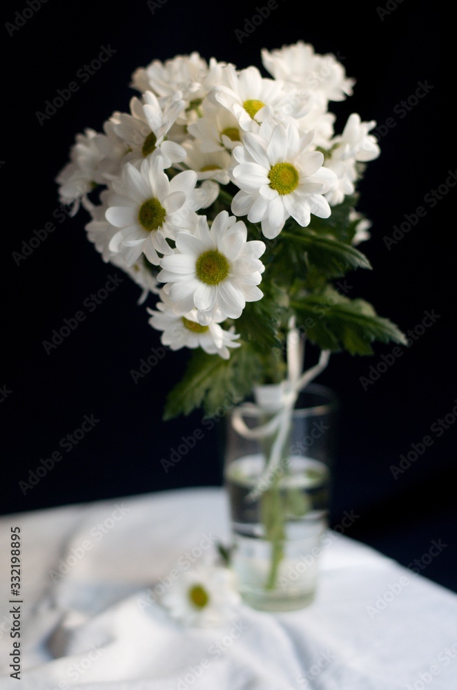 Flowers in the glass of water 
