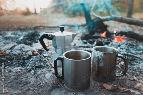 bonfire and geyser coffee maker in the foreground