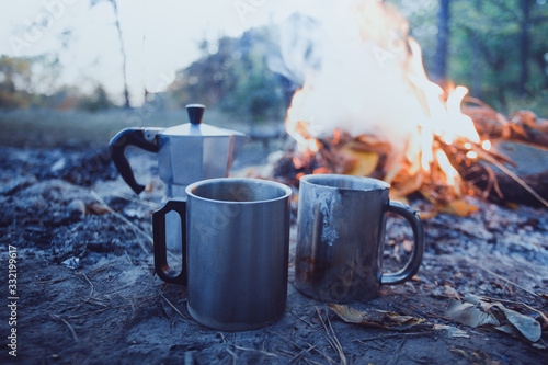 bonfire and geyser coffee maker in the foreground