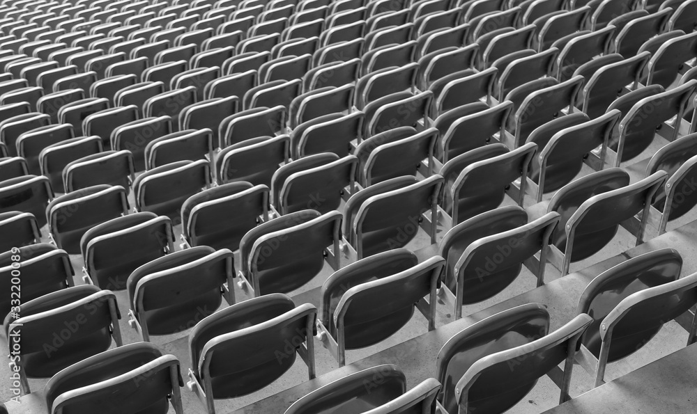Naklejka premium seats at the stadium without the spectators due to the Corona Vi