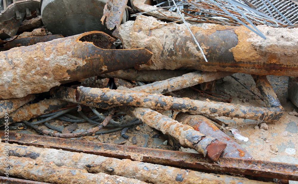 old rusty pipes of a construction site in the landfill old rusty pipes of a construction site in the landfill