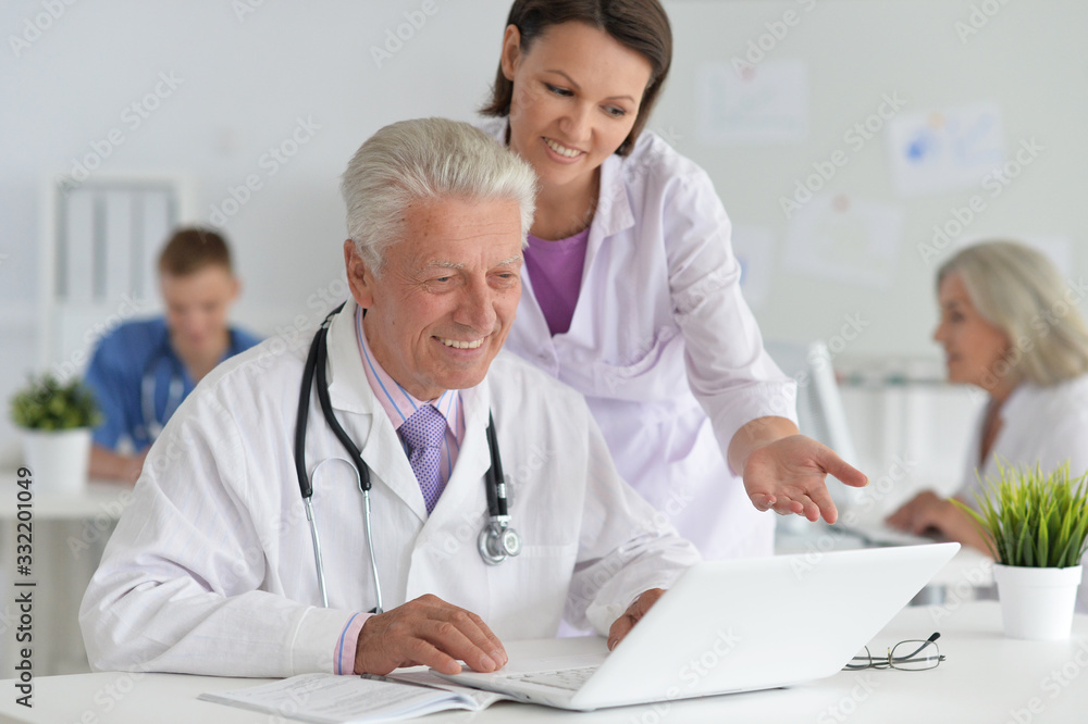 Portrait of professional doctors working in cabinet Portrait of professional doctors working in cabinet
