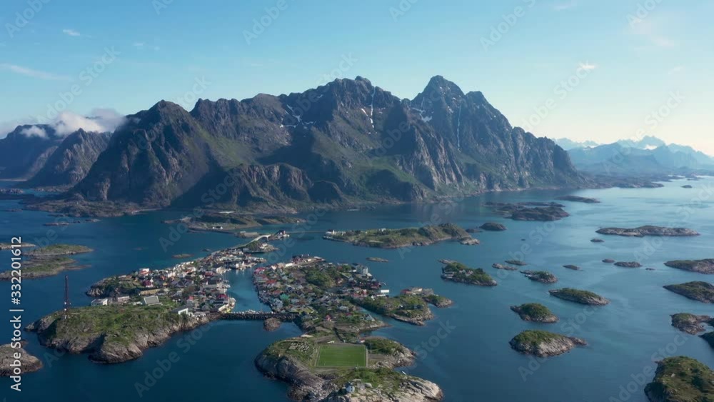 aerial view. flight over Alantic ocean and view on fishing village Henningsvaer .Lofoten Islands,Norway.