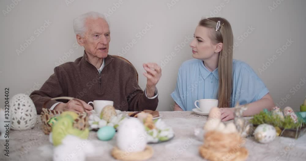 Happy Easter - Grandfather and Granddaughter Spending Easter Together Talking at Home. Happy Easter - Grandfather and Granddaughter Spending Easter Together Talking at Home.
