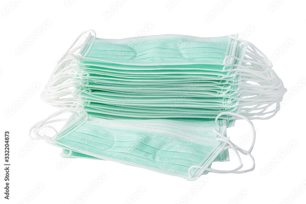 Stack of blue color mask isolated on white background for protect infection and kill Novel Coronavirus (2019-nCoV) Covid-19 virus. Stack of blue color mask isolated on white background for protect infection and kill Novel Coronavirus (2019-nCoV) Covid-19 virus.