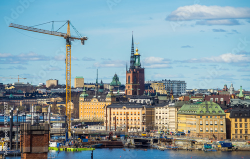 April 22, 2018. Stockholm, Sweden. Construction cranes over the historic center of Stockholm in clear weather.