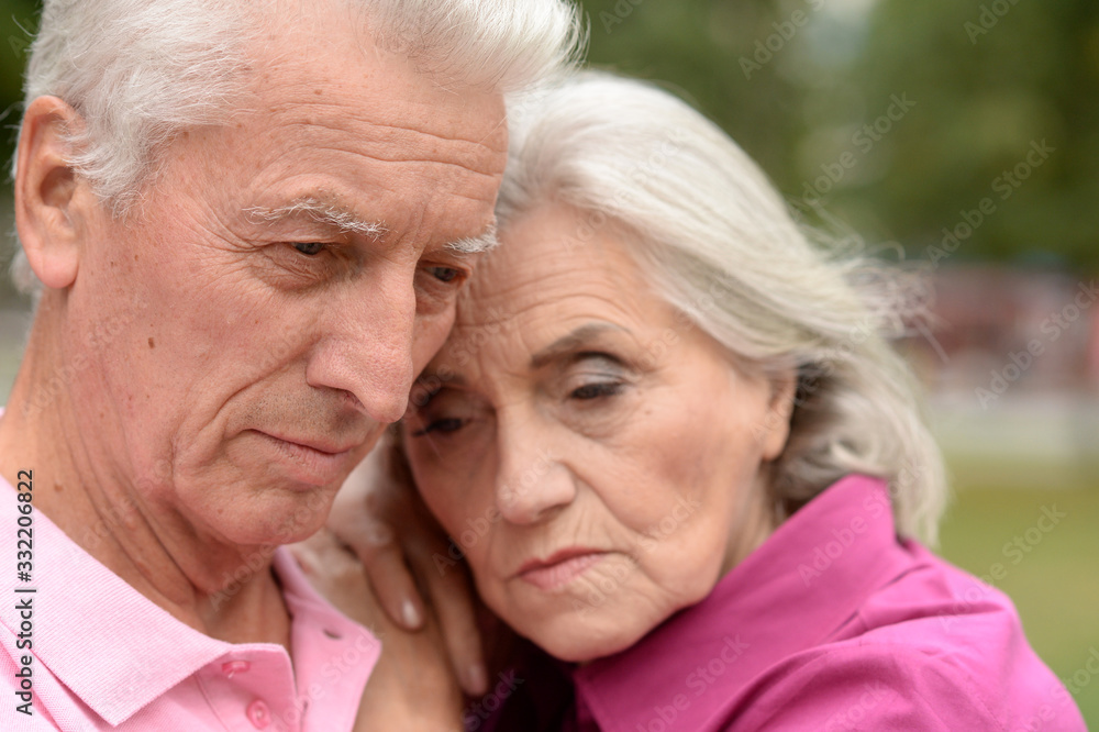 Close up portrait of unhappy senior couple Close up portrait of unhappy senior couple