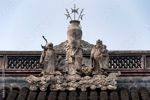 chinese wise men statue shanghai city god temple photo